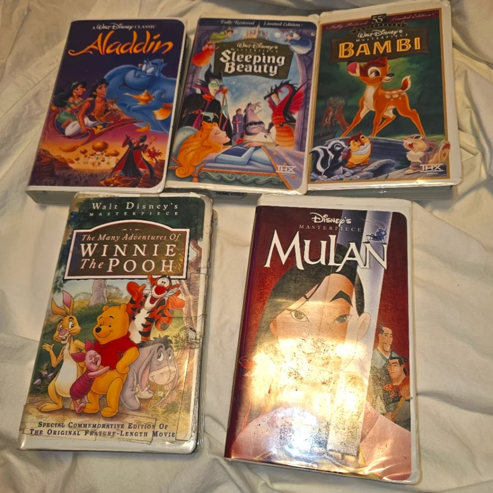 Vintage VHS Movie Collection Aladdin Sleeping Beauty Bambi Mulan Winnie The Pooh